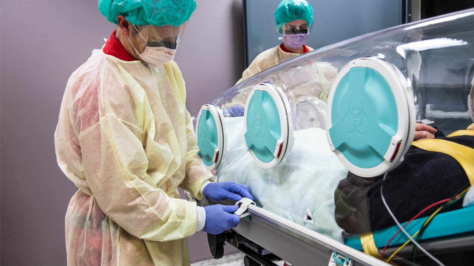 Two health care professionals opening the epishuttle